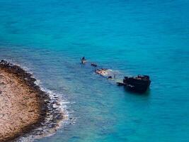 Large sunken ship in the shallows, Crete, Greece photo