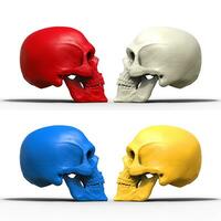 Multicolored skulls  - isolated on black background photo