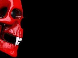 Red vampire skull with white teeth and black eyes - cut shot photo