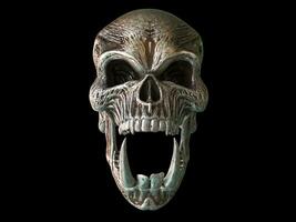 Rusted metal screaming demon skull with big sharp lower tusks photo