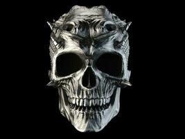 Smiling metal demon skull with small horns photo