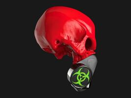 Red skull with black biohazard gas mask on - side view photo