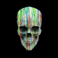 White skull splattered with red, green, blue and yellow paint photo