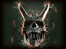 Demon skull with long sharp teeth - grunge type illustration photo