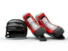 Black hockey helmet with red hockey skates - isolated on white background photo