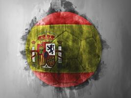 Español bandera en un fútbol pelota foto