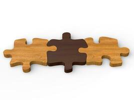 Three wooden puzzle pieces put together photo