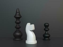 Black and white chess pieces on dark background photo