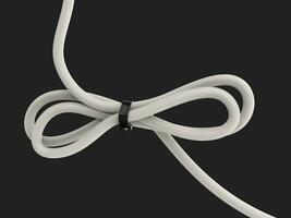 White cable tied to a neat knot photo