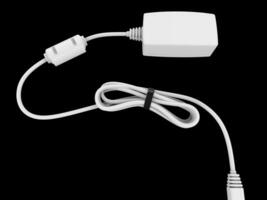 Device with white cable bent and coiled up and held with black rubber band - top down view photo