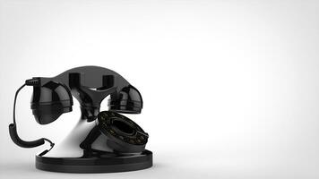 Shiny black vintage telephone - side view photo