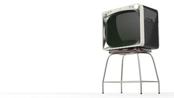 Vintage black TV set with white front on a stand photo