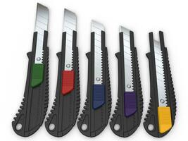 Safety knives with snap different coloured retract buttons photo