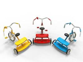 Red, blue and yellow tricycles - top view photo