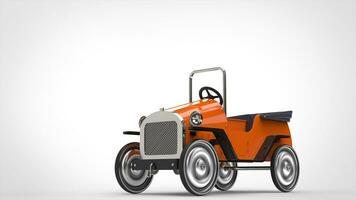 Orange vintage toy car with metallic wheels photo
