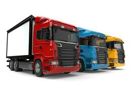 Red, blue and yellow modern transport trucks photo