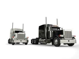 Midnight black and bright white 18 wheeler trucks photo