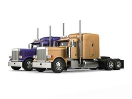 Purple and gold big semi - trailer trucks - side by side photo