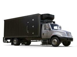 Silver refrigerator truck with black trailer unit photo