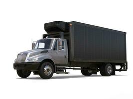 Silver refrigerator truck with black trailer photo