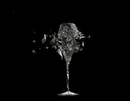 Shattered vine glass - on black background photo