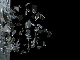 Broken glass window - pieces flying through the air photo