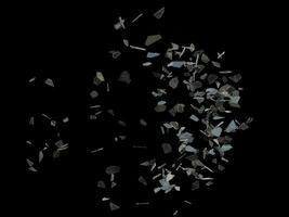Shattered glass pieces flying through the air photo