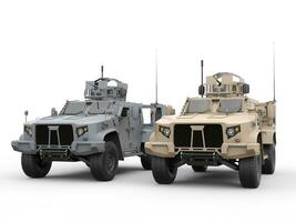 Two military all terrain light armor tactical vehicles photo