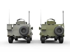 Military all terrain tactical vehicles - green and grey - rear view photo