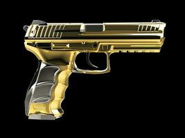 Golden modern semi automatic pistol photo