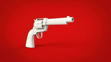 White vintage revolver gun on a red background photo