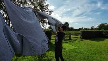 Sunny Laundry Day Clothes Hanging on a Fresh Breeze video