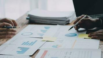 Team of business people working together in the meeting room office, teamwork background charts and graphs banner, double exposure successful teamwork,business planning concept. video
