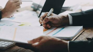 Team of business people working together in the meeting room office, teamwork background charts and graphs banner, double exposure successful teamwork,business planning concept. video