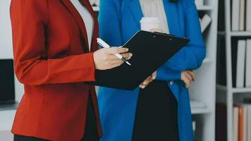 Team of business people working together in the meeting room office, teamwork background charts and graphs banner, double exposure successful teamwork,business planning concept. video