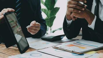 Team of business people working together in the meeting room office, teamwork background charts and graphs banner, double exposure successful teamwork,business planning concept. video