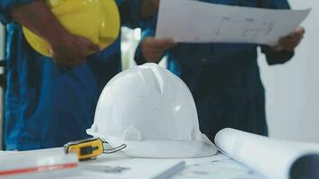 Three Heavy Industry Engineers Stand in Pipe Manufacturing Factory, Use Digital Tablet Computer, Have Discussion. Large Pipe Assembled. Design and Construction of Oil, Gas and Fuels Transport Pipeline video