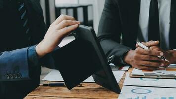 Team of business people working together in the meeting room office, teamwork background charts and graphs banner, double exposure successful teamwork,business planning concept. video