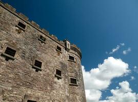 Old celtic castle tower walls, Cork City Gaol prison in Ireland. Fortress, citadel background photo