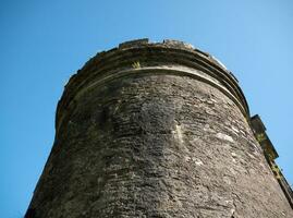 Old celtic castle tower walls, Cork City Gaol prison in Ireland. Fortress, citadel background photo