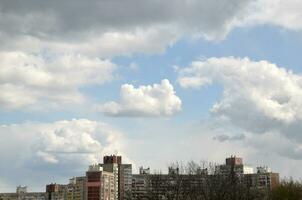 Natural cloudscape over modern city photo