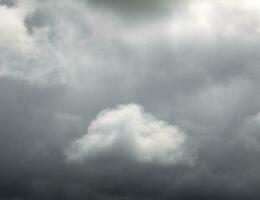 Stormy clouds background, grey smoke from fire photo