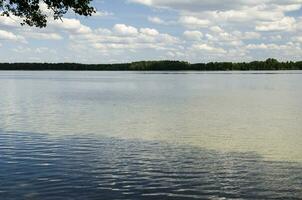 Waves in the evening lake photo