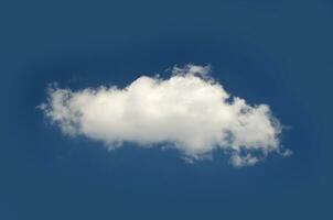 Single cloud isolated over blue sky background photo