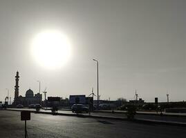 Mosque silhouette and the road photo