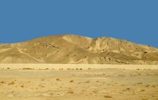 Sahara desert dunes and sand hills photo