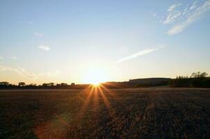 amanecer y campos foto