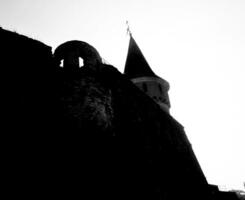 Castle wall and tower medieval fortification silhouette photo