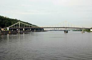 Bridge across the river Dnipro in Kyiv, Ukraine photo