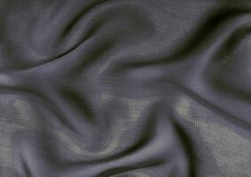 Deep blue glossy cloth texture background. Natural textile material photo, pattern cover photo